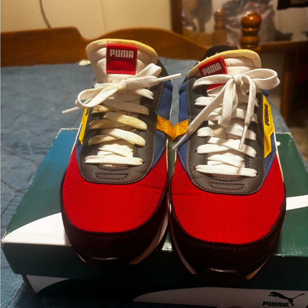 Puma Red, Blue, and Yellow Sneakers. Big kids size 7 fits women’s 8.5 or 9.